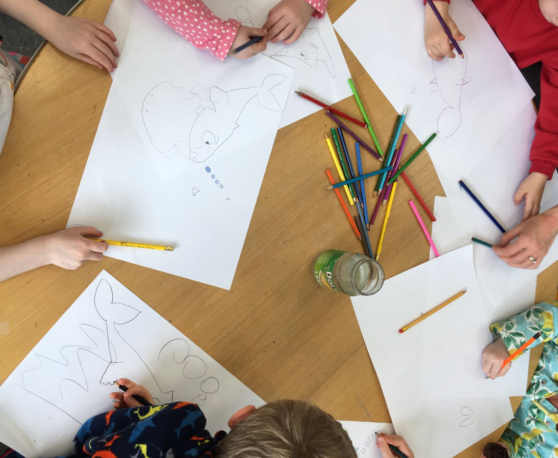 Children drawing Finn the whale