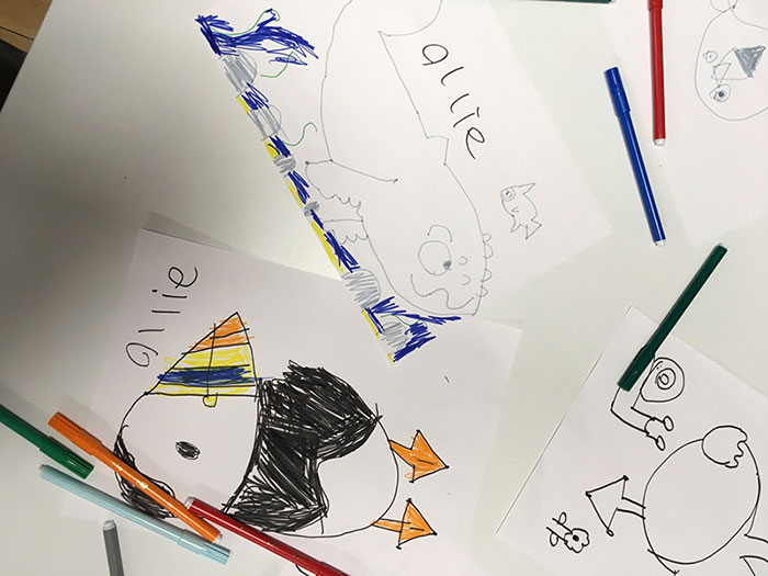 Child's drawings of a puffin and a whale