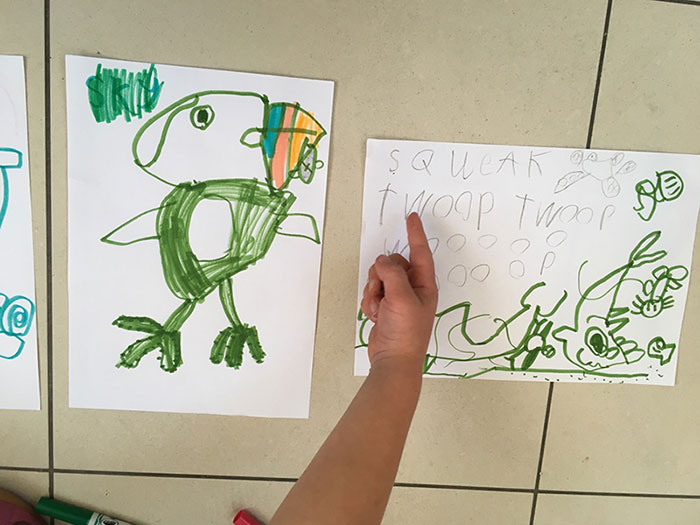 Child's drawings of a puffin and of whale song