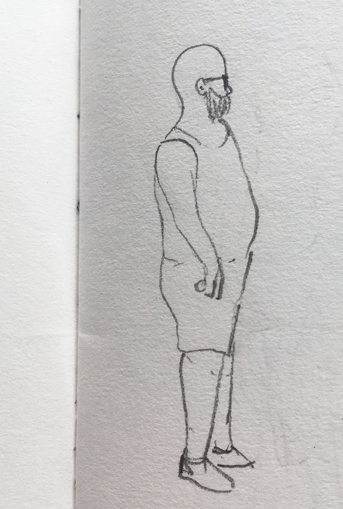 sketch of a bald man standing