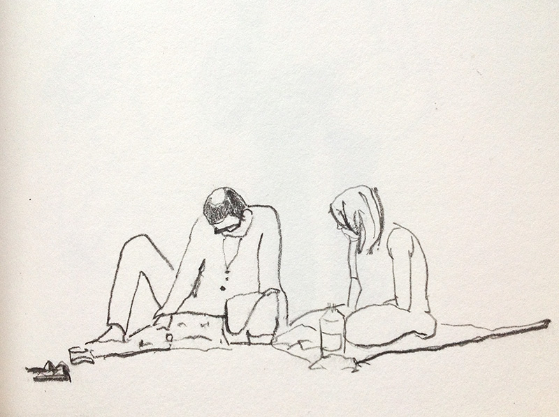 sketch of two people on a mat