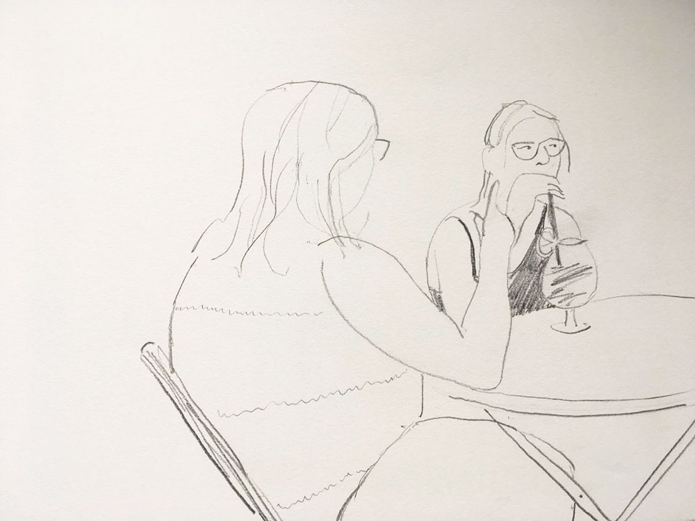 sketch of girl drinking and friend at table