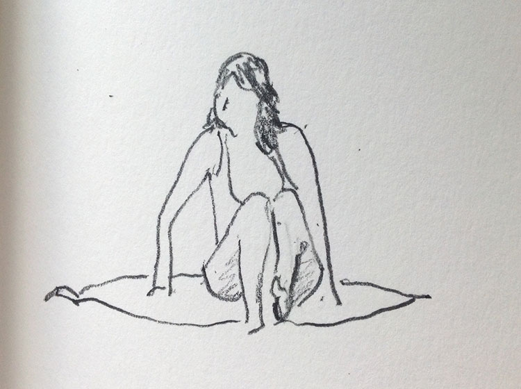 sketch of woman sitting on the beach